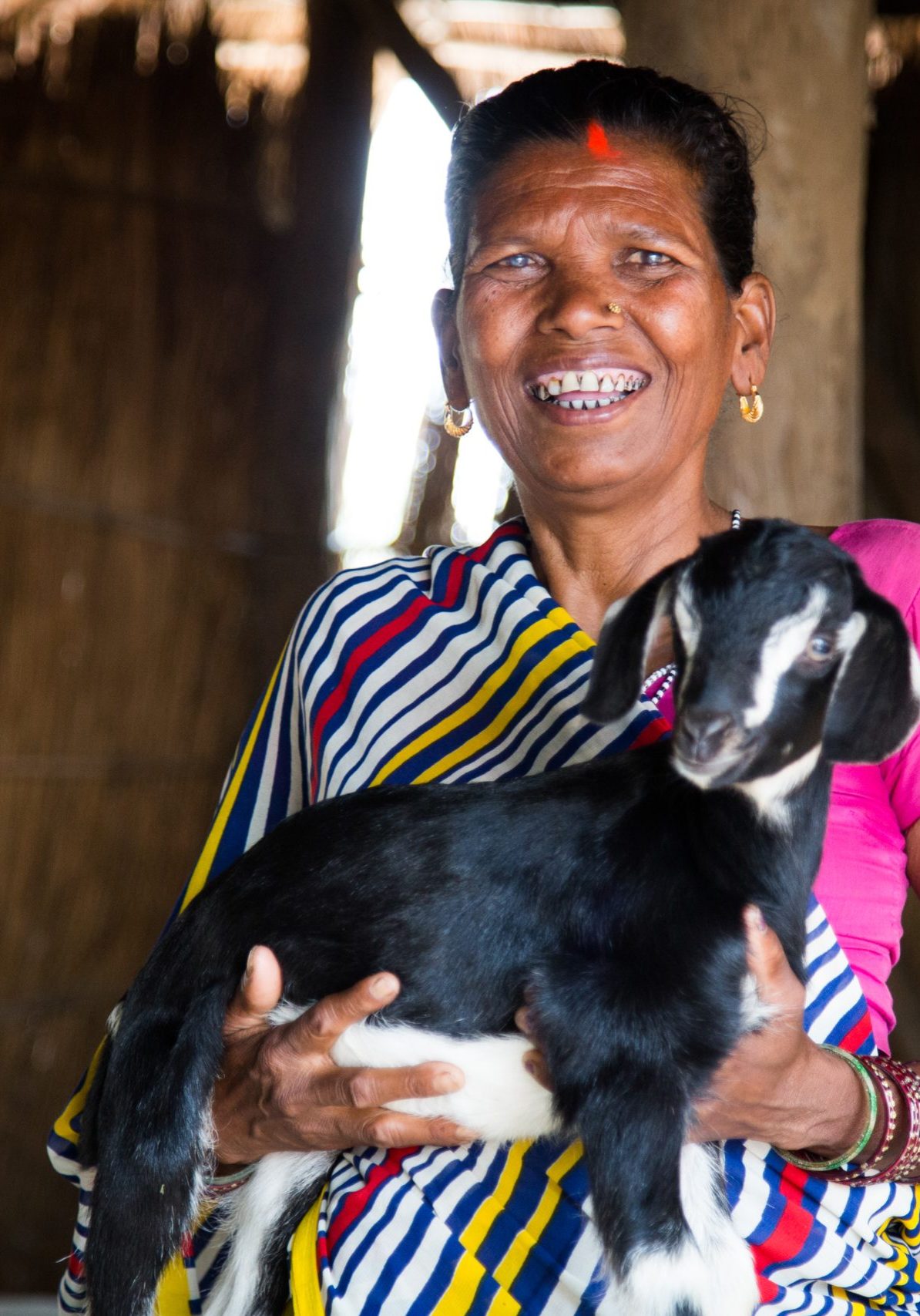 Ramu and Gauda (pictured) are beneficiaries of the Bettiah Diocese Social Service Society, a CRS partner. While their children have migrated for work, they are active in the society's events and determined that their grandchildren complete their education. The project has also helped them with immunizations to keep their goats healthy and able to supplement their income. The projects aims to prevent labor trafficking in villages throughout Bihar state in India. Due to limited income options and poor quality of education, migration is a common practice, particularly for boys ages 8-14. These boys often travel to locations hundreds of kilometers away to work in brick kilns, construction, textile factories and other industries.